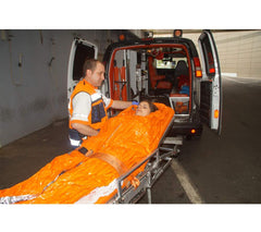 Blizzard EMS Blanket high-visibility orange aids location by SAR teams in challenging environments.