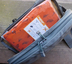 Blizzard EMS Blanket fits plate carriers and hydration sleeves for ready warmth.