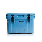 Blue Coolers Cobalt 25qt front view shows rugged roto-molded durability for outdoor use.