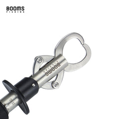 Booms Fishing G01 in-use grip demonstrating one-handed operation while landing a catch.