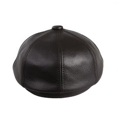 BOONJOVIA men's newsboy cap front view in black leather delivers classic elegance.