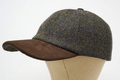 Munro cap leather adjustment buckle close-up for comfortable fit