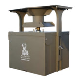 Boss Buck feeder conversion kit in rugged outdoor setting for automatic game attraction.