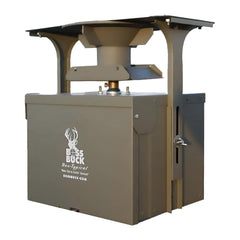Boss Buck feeder conversion kit in rugged outdoor setting for automatic game attraction.