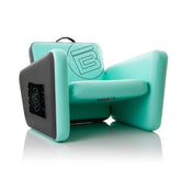 BOTE Aero inflatable chair on the beach offers portable comfort.