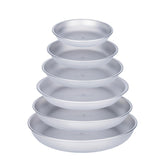 Boundless Voyage titanium camping plate dinner on a rugged table for outdoor meals.