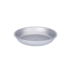 Boundless Voyage titanium camping plate dinner in rugged outdoor setting.