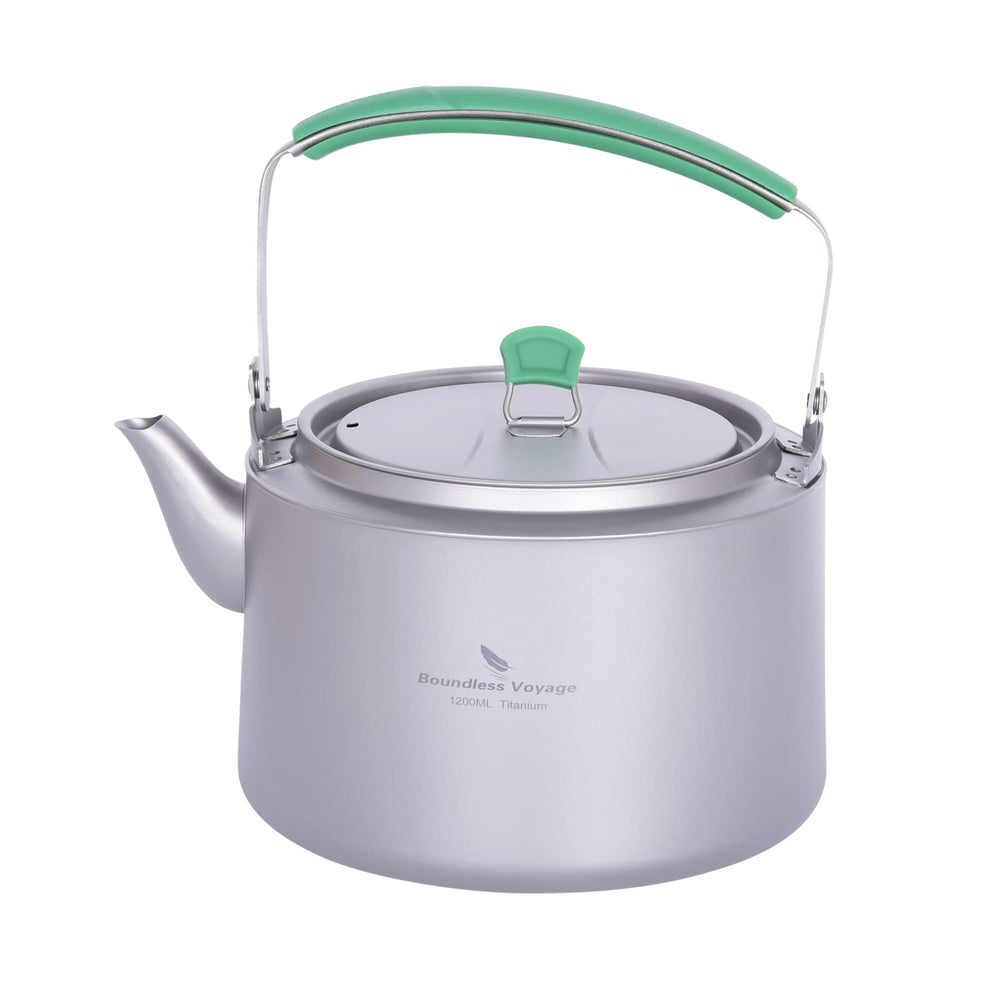 Boundless Voyage titanium kettle 1200ml ready to pour hot water outdoors.