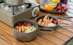 Boundless Voyage titanium 500ml pan, compact and lightweight for hikers.