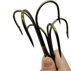 Six bronze treble hooks in 12/0 and 14/0 sizes (product close-up)