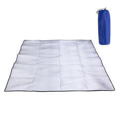 Brrnoo camping mat spread as a picnic blanket outdoors.