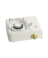 BRUNO BOE094-IV cassette stove on table for compact outdoor meals.