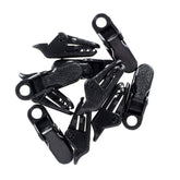 Built For Survival awning tarp clamps securing fabric for a taut campsite.