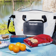 Bushnell Soft Cooler interior with drinks and ice, ready to keep items cold.