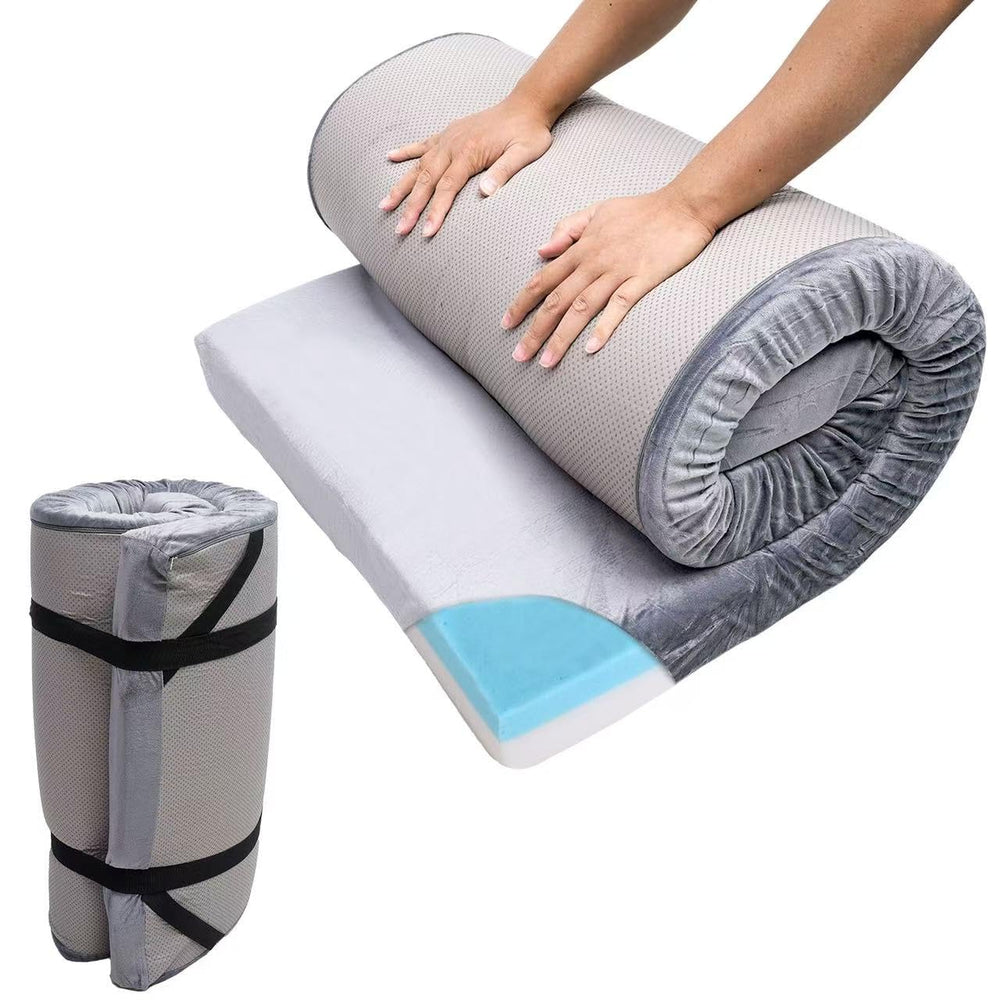 The Bzvystux memory-foam sleeping pad in roll-up form for easy travel and space-saving storage.
