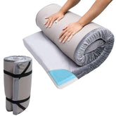 The Bzvystux memory-foam sleeping pad in roll-up form for easy travel and space-saving storage.