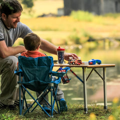Camco folding table with telescoping aluminum legs, easy transport and setup.