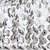 CamoSystems Ultra-lite netting in snow-white tones provides light concealment for field setups.