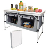 Camp Field folding table white, assembled for outdoor dining.