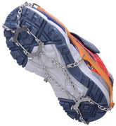 CAMP Snowline Chainsen Kids Crampon on boot delivering secure ice traction for kids.