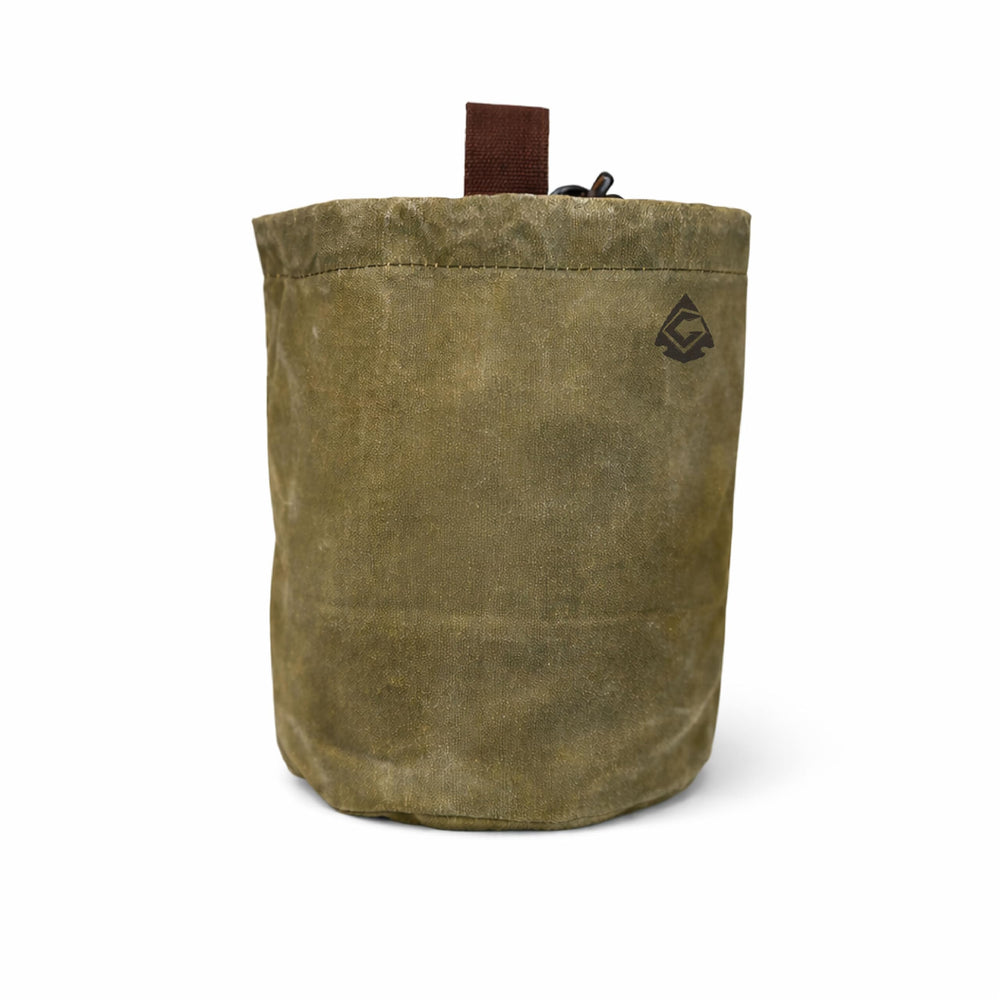 Campcraft Outdoors 2QT bushcraft cookware bag in waxed canvas protects gear in damp outdoor conditions.