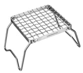 Camping Moon folding camping grill for open-fire cooking.