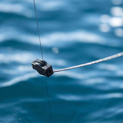 Cannon Retro-Ease weight retriever in use on boat, retrieves weight quickly and safely