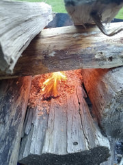 CC's Wood Shack Fire Starter lighting on logs for fast start.