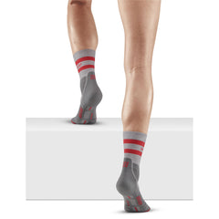 CEP 80's hiking mid-cut socks highlight ankle compression for added stability during climbs.