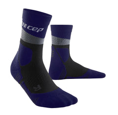 CEP Max Cushion hiking mid-cut socks in grey and black worn on trail-ready foot for all-day comfort.