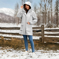 CHIGUO long rain jacket back view shows extended coverage against rain and wind.