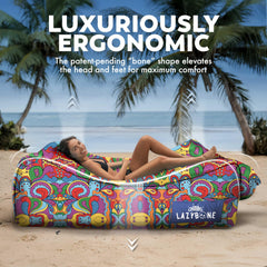 Chillbo LazyBone couch in bold print adds style to festival or beach setups.