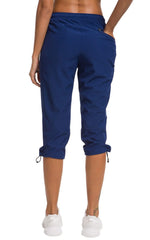 ChinFun quick-dry pants navy zippered pockets close-up, durable YKK zips for travel.