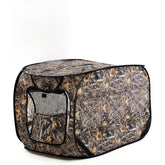 Chunm dog blind weed-print camouflage blends into field terrain for duck hunting.
