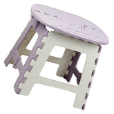 Ciieeo purple folding chair outdoors for camping or picnics.