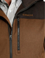 Cinch men's brown hooded softshell jacket, pockets close-up, showing secure zip pockets for outdoor storage.