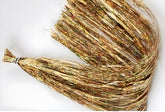 Circle B Tackle Hedron Flashabou gold skirt closeup shows durable, reflective shine for offshore lures.