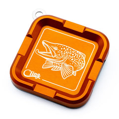 Cling Fishing Mag Grab Plus orange hookjaw front view for quick fly access on vests and shirts.
