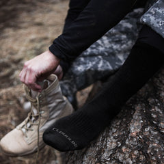 CloudLine merino wool socks seamless toe design reduces irritation during long wear.