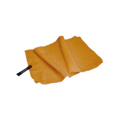 COCOON Hyperlight Towel Sunrise Small rolled for ultra-compact packing and travel convenience.
