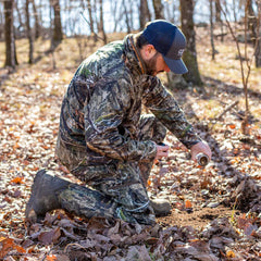 Code Blue Grave Digger bottle pour demonstrates immediate scent release to attract deer
