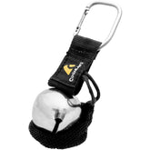 Coghlan's magnetic bear bell with carabiner attached to a backpack for easy trail safety.
