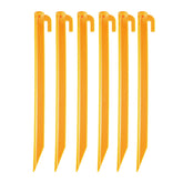 Coghlan's tent pegs in bright yellow improve visibility and campsite safety.