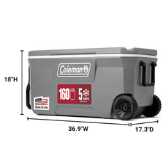 Coleman Classic 100-Quart cooler wheel assembly enabling easy transport over terrain