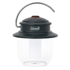 Coleman Classic 800L lantern on a table provides bright campsite lighting.
