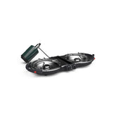 Coleman Fold N Go stove in compact folded form for portable campsite setup.