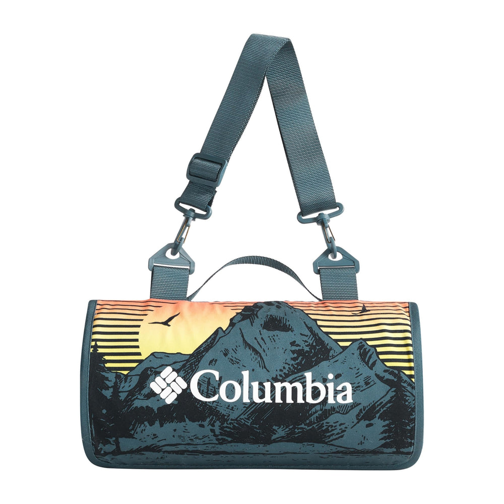 Columbia packable tote blanket folded neatly in its compact tote for easy travel.