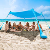 COMMOUDS beach tent 7x7ft setup provides ample shade for families.