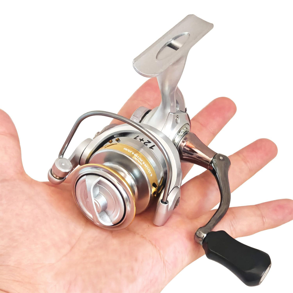 Compact spinning reel on ice in silver finish