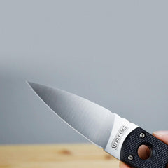 Compact neck knife designed for concealed carry and outdoor use